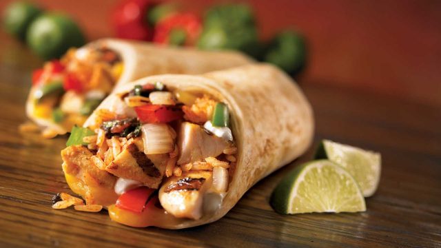burrito stuffed with peppers, rice, chicken